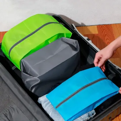 Bolsa de almacenamiento de zapatos de viaje bolso de cremallera de tela impermeable portátil